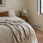 Ink Stripe Cotton-Blend Throw — shown in use